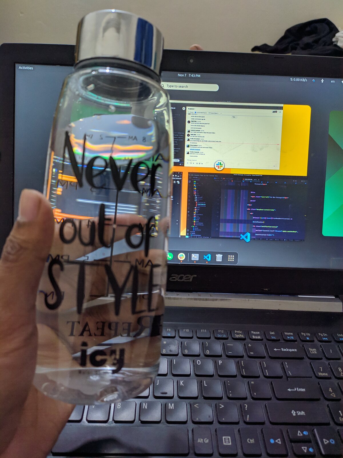 A laptop connected to an external monitor showing code.
